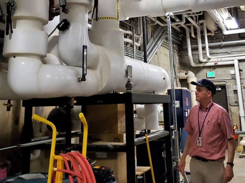 Facilities project manager Henry Jerome at Johnson High School, where a an $18.8 million geothermal project expects to cut natural gas consumption by more than half.