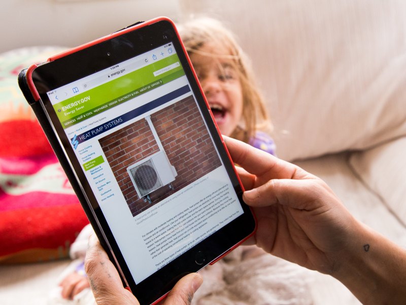 A resident researches energy efficient heat pumps.