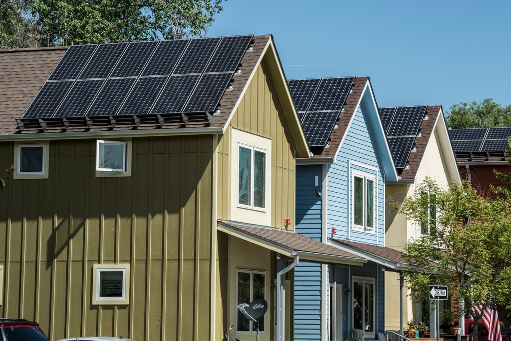 A line of houses with rooftop solar.