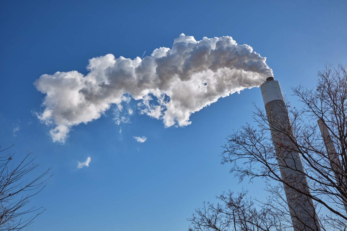 Smokestacks of the Clifty Creek Generating Station against a blue sky.