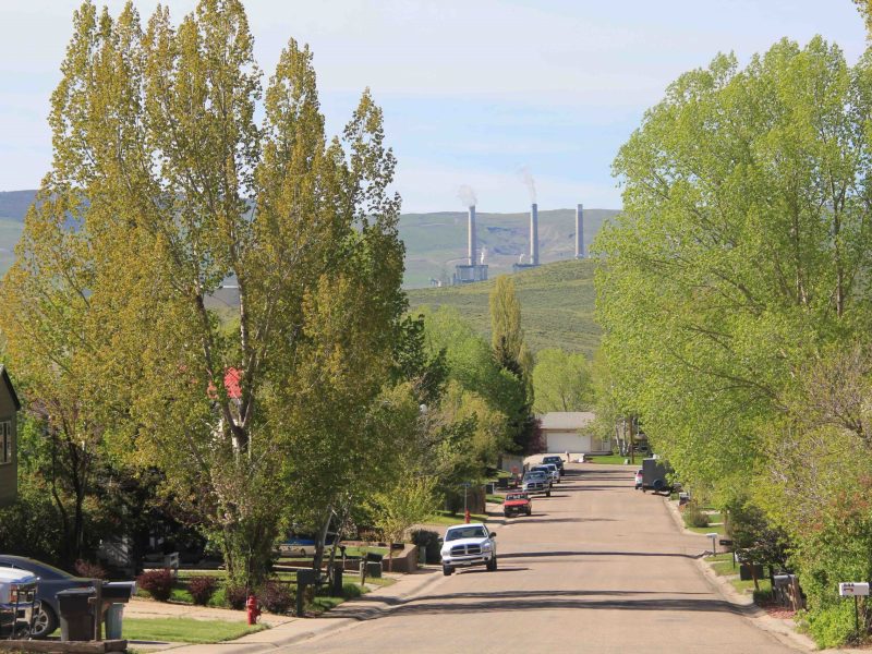 colorado town with power plant in distance