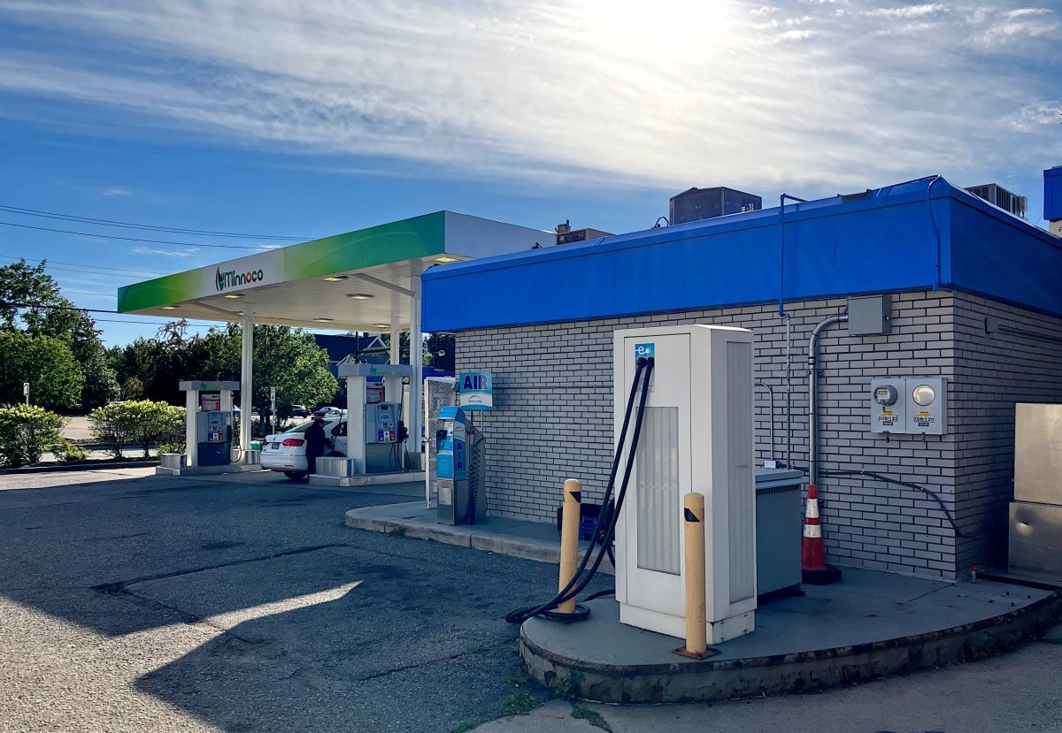 electric car charger at gas station