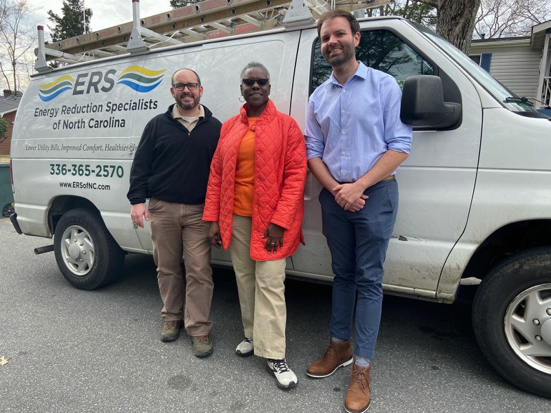 Paul Swenson, left, a vice president at Energy Reduction Specialists; Dr. Rita Joyner, center, and Daniel Pate of the North Carolina Sustainable Energy Association.